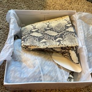 Snake skin mid shin heel boots